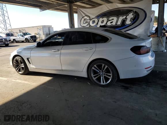 2016 BMW 4 Series 428i with VIN WBA4A9C57GG695179, listed as a Copart auction lot 87263125 with 143,435 mi miles and Clean title. Bid and sale history available at DreamBid. Image 2.