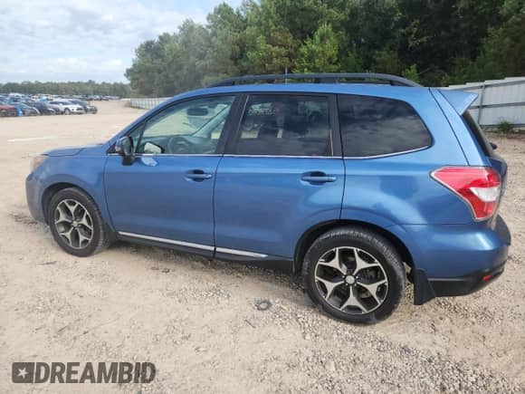 2015 Subaru Forester XT Touring with VIN JF2SJGWC3FH511522, listed as a Copart auction lot 82362975 with 132,782 mi miles and Salvage title. Bid and sale history available at DreamBid. Image 2.