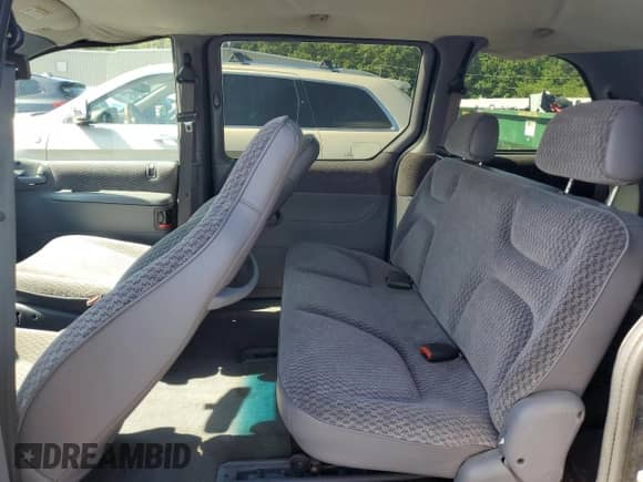 2000 Dodge Caravan SE z VIN 2B4GP45R0YR850038, wystawiony jako Copart lot #82138045 z przebiegiem 173 111 mil mil oraz Czysty tytuł • Clean title. Historia ofert i sprzedaży dostępna na DreamBid. Obrazek 11.