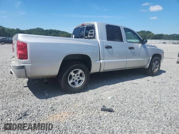 2007 Dodge Dakota SLT с VIN 1D7HE48P17S164732, выставлен на аукционе Copart как лот 80075525 с пробегом 230 632 миль миль и Списание • Salvage title. История ставок и продаж доступна на DreamBid. Изображение 3.