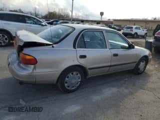 1999 Chevrolet Prizm z VIN 1Y1SK5484XZ401262, wystawiony jako Copart lot #78032974 z przebiegiem 161 904 mil mil oraz Szkoda całkowita • Salvage title. Historia ofert i sprzedaży dostępna na DreamBid. Obrazek 3.