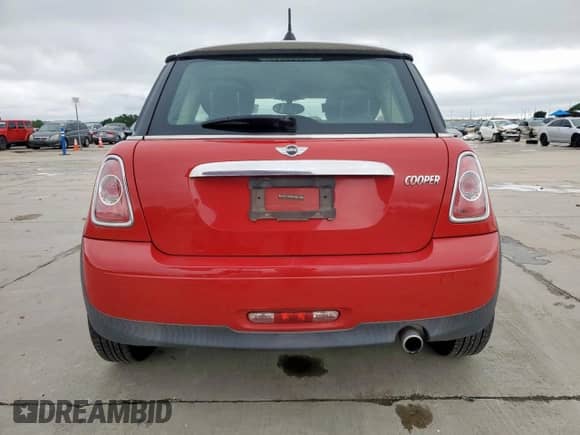 2012 MINI Hardtop with VIN WMWSU3C56CT261218, listed as a Copart auction lot 60810455 with 60,770 mi miles and Salvage title. Bid and sale history available at DreamBid. Image 6.