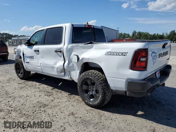 2025 Ram 1500 Warlock with VIN 1C6SRFGP1SN702488, listed as a Copart auction lot 57148285 with 1,183 mi miles and Salvage title. Bid and sale history available at DreamBid. Image 2.