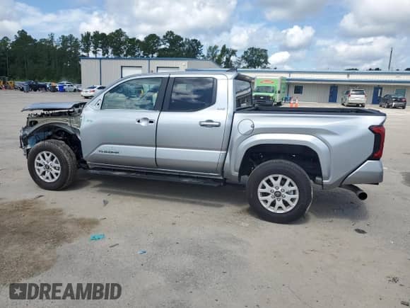 2024 Toyota Tacoma SR5 with VIN 3TMKB5FN1RM023512, listed as a Copart auction lot 68438505 with 5,994 mi miles and Salvage title. Bid and sale history available at DreamBid. Image 2.