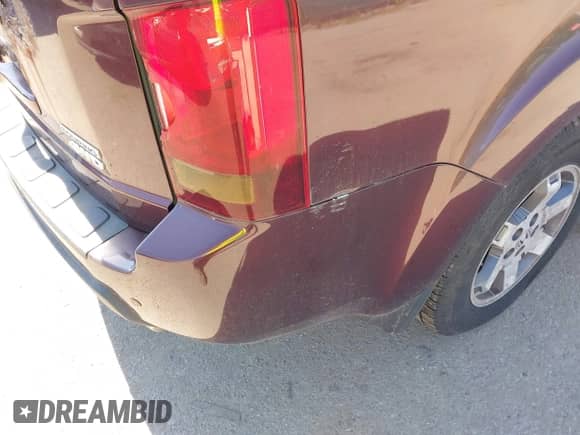 2010 Honda Pilot Touring with VIN 5FNYF4H99AB040690, listed as a IAAI auction lot 43338979 with 228,177 mi miles and . Bid and sale history available at DreamBid. Image 6.