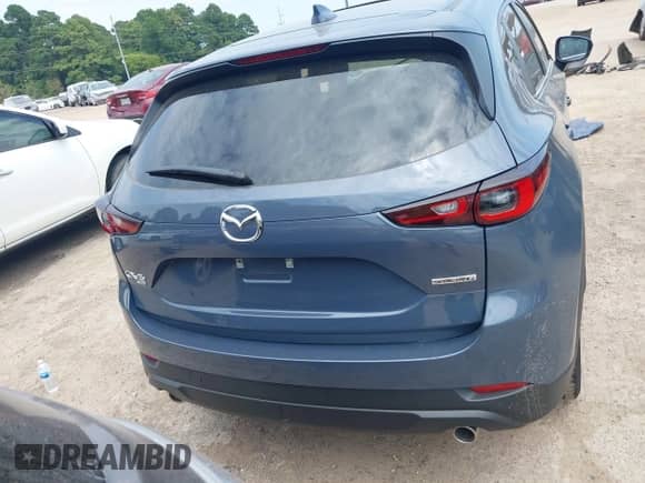2025 Mazda CX-5 S Carbon Edition z VIN JM3KFBCM5S0702469, wystawiony jako IAAI lot #43076943 z przebiegiem 725 mil mil oraz . Historia ofert i sprzedaży dostępna na DreamBid. Obrazek 17.