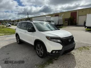 2021 Honda Passport Touring with VIN 5FNYF7H9XMB009275, listed as a Copart auction lot 83768205 with 23,402 mi miles and Salvage title. Bid and sale history available at DreamBid. Image 1.