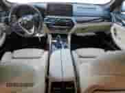 2023 BMW 5 Series 530e z VIN WBA13AG07PCN54326, wystawiony jako Copart lot #80466255 z przebiegiem 35 881 mil mil oraz Szkoda całkowita • Salvage title. Historia ofert i sprzedaży dostępna na DreamBid. Obrazek 8.