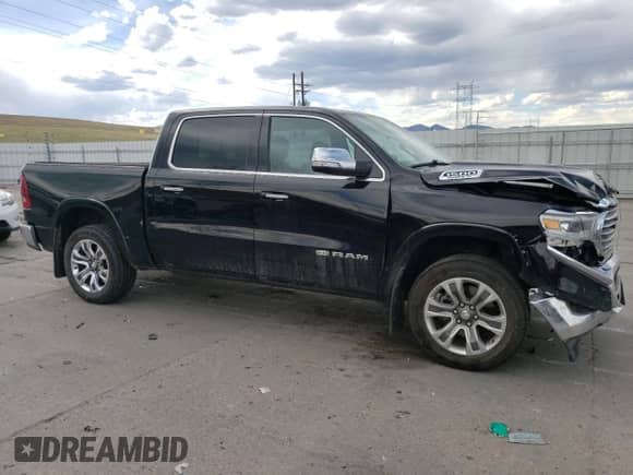 2020 Ram 1500 Longhorn with VIN 1C6SRFKT5LN220743, listed as a Copart auction lot 50660925 with 58,167 mi miles and Salvage title. Bid and sale history available at DreamBid. Image 4.