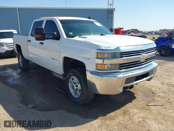 2015 Chevrolet Silverado 2500HD Work Truck z VIN 1GC1KUE81FF569806, wystawiony jako IAAI lot #42896050 z przebiegiem 160 673 mil mil oraz . Historia ofert i sprzedaży dostępna na DreamBid. Obrazek 1.