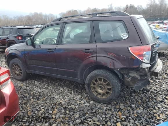 2013 Subaru Forester X z VIN JF2SHABC2DG428777, wystawiony jako Copart lot #52517655 z przebiegiem 131 275 mil mil oraz Szkoda całkowita • Salvage title. Historia ofert i sprzedaży dostępna na DreamBid. Obrazek 2.