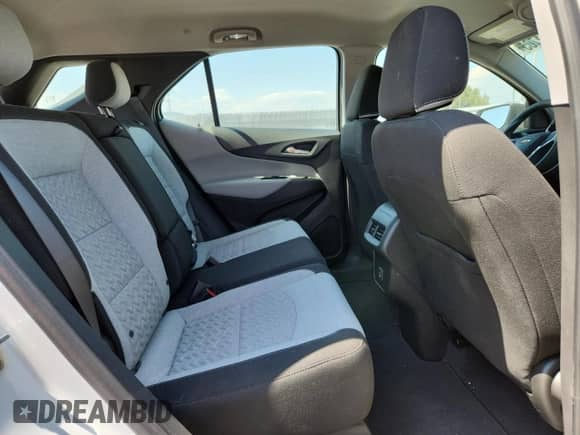 2022 Chevrolet Equinox LS z VIN 3GNAXSEVXNS240079, wystawiony jako Copart lot #68281705 z przebiegiem 17 996 mil mil oraz Szkoda całkowita • Salvage title. Historia ofert i sprzedaży dostępna na DreamBid. Obrazek 11.