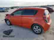2012 Chevrolet Sonic LT z VIN 1G1JD6SHXC4125785, wystawiony jako Copart lot #89107785 z przebiegiem 118 059 mil mil oraz Szkoda całkowita • Salvage title. Historia ofert i sprzedaży dostępna na DreamBid. Obrazek 2.