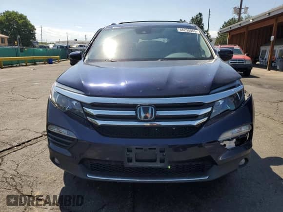 2018 Honda Pilot Touring with VIN 5FNYF6H94JB057389, listed as a Copart auction lot 68290065 with 76,831 mi miles and Salvage title. Bid and sale history available at DreamBid. Image 5.