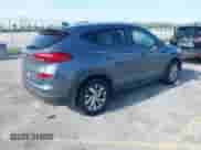 2021 Hyundai Tucson Value with VIN KM8J33A40MU323196, listed as a IAAI auction lot 42051007 with 84,446 mi miles and . Bid and sale history available at DreamBid. Image 4.