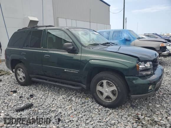 2003 Chevrolet TrailBlazer LT with VIN 1GNDS13S632159748, listed as a Copart auction lot 59325555 with 174,740 mi miles and Salvage title. Bid and sale history available at DreamBid. Image 4.