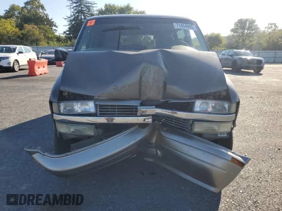 2002 Chevrolet Astro z VIN 1GNEL19X22B109349, wystawiony jako Copart lot #71454905 z przebiegiem 144 417 mil mil oraz Szkoda całkowita • Salvage title. Historia ofert i sprzedaży dostępna na DreamBid. Obrazek 5.