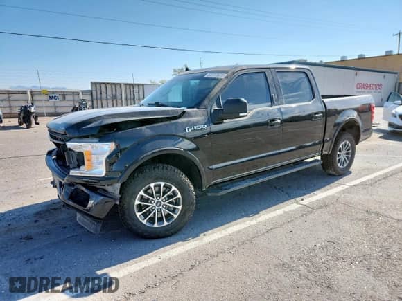 2020 Ford F-150 XL with VIN 1FTEW1E44LKD60628, listed as a Copart auction lot 62777675 with 96,121 mi miles and Salvage title. Bid and sale history available at DreamBid. Image 1.
