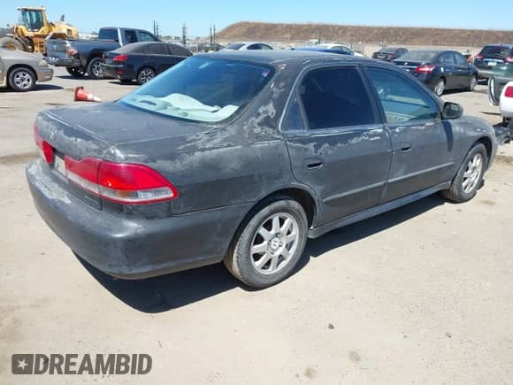 2002 Honda Accord SE with VIN 1HGCG56702A112502, listed as a IAAI auction lot 42930750 with 211,768 mi miles and . Bid and sale history available at DreamBid. Image 4.