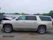 2015 Chevrolet Suburban LT with VIN 1GNSKJKC5FR569101, listed as a IAAI auction lot 42631110 with 183,729 mi miles and . Bid and sale history available at DreamBid. Image 14.