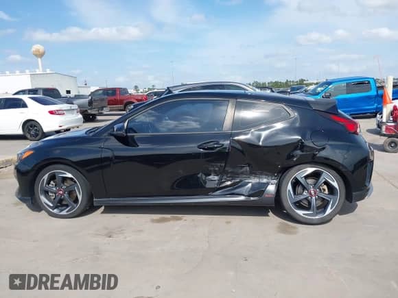 2019 Hyundai Veloster Turbo R-Spec z VIN KMHTH6AB1KU006986, wystawiony jako IAAI lot #42052689 z przebiegiem 92 317 mil mil oraz . Historia ofert i sprzedaży dostępna na DreamBid. Obrazek 14.