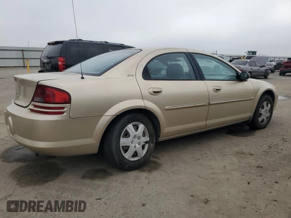 2001 Dodge Stratus with VIN 1B3EJ46X31N610365, listed as a Copart auction lot 89020885 with 162,730 mi miles and Salvage title. Bid and sale history available at DreamBid. Image 3.