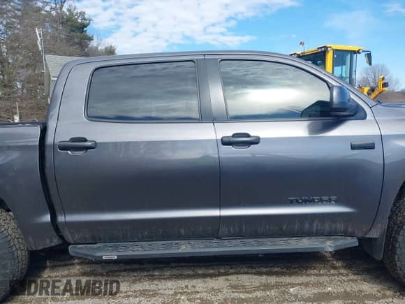2021 Toyota Tundra SR5 z VIN 5TFDY5F19MX015729, wystawiony jako IAAI lot #41694978 z przebiegiem 72 283 mil mil oraz . Historia ofert i sprzedaży dostępna na DreamBid. Obrazek 14.