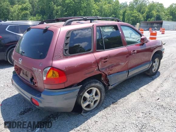 2004 Hyundai Santa Fe z VIN KM8SB12B84U628261, wystawiony jako IAAI lot #42581376 z przebiegiem 191 253 mil mil oraz . Historia ofert i sprzedaży dostępna na DreamBid. Obrazek 4.