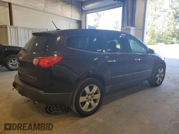 2009 Chevrolet Traverse LTZ with VIN 1GNEV33D29S132547, listed as a Copart auction lot 70061145 with 130,931 mi miles and Clean title. Bid and sale history available at DreamBid. Image 3.