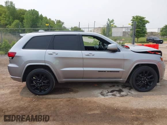 2020 Jeep Grand Cherokee Laredo E with VIN 1C4RJFAG7LC427620, listed as a IAAI auction lot 42403254 with 34,414 mi miles and . Bid and sale history available at DreamBid. Image 13.