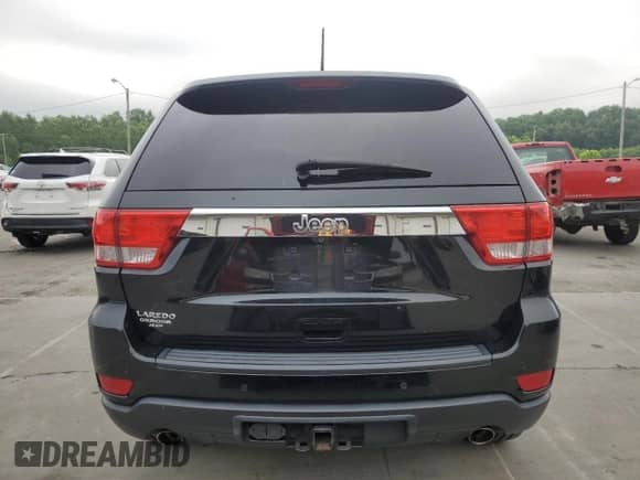 2012 Jeep Grand Cherokee Laredo с VIN 1C4RJEATXCC317054, выставлен на аукционе Copart как лот 63057615 с пробегом 159 633 миль миль и Списание • Salvage title. История ставок и продаж доступна на DreamBid. Изображение 6.