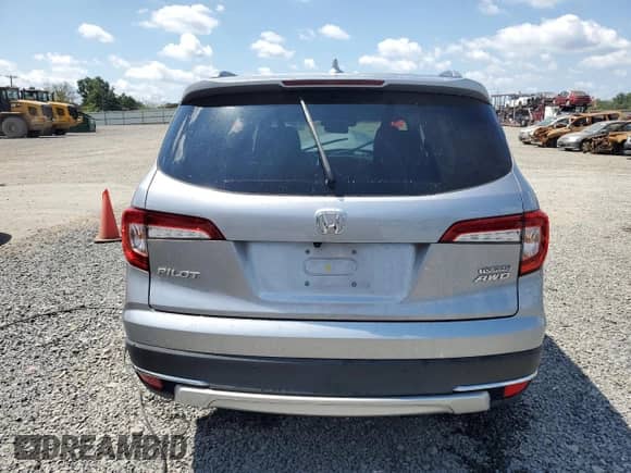 2020 Honda Pilot Touring 8-Passenger z VIN 5FNYF6H92LB010073, wystawiony jako Copart lot #68330455 z przebiegiem 28 856 mil mil oraz Szkoda całkowita • Salvage title. Historia ofert i sprzedaży dostępna na DreamBid. Obrazek 6.