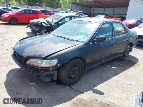 2000 Honda Accord LX with VIN 1HGCG1649YA083587, listed as a IAAI auction lot 42083716 with 268,423 mi miles and . Bid and sale history available at DreamBid. Image 2.