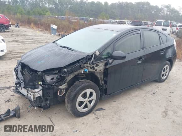 2015 Toyota Prius Four with VIN JTDKN3DU1F1996520, listed as a IAAI auction lot 41564249 with 194,433 mi miles and . Bid and sale history available at DreamBid. Image 2.