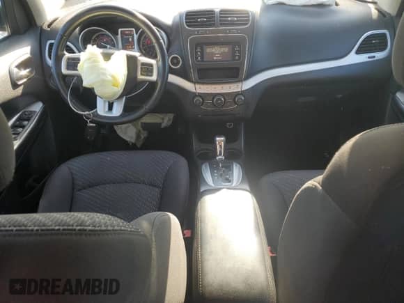 2015 Dodge Journey American Value with VIN 3C4PDCABXFT587565, listed as a Copart auction lot 70646315 with 143,960 mi miles and Salvage title. Bid and sale history available at DreamBid. Image 8.