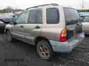 2003 Chevrolet Tracker with VIN 2CNBJ13C236947064, listed as a IAAI auction lot 41820066 with Not provided miles and . Bid and sale history available at DreamBid. Image 3.