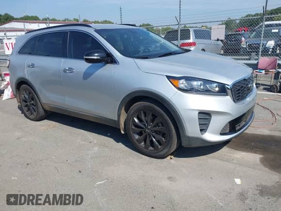 2020 Kia Sorento LX z VIN 5XYPG4A57LG710216, wystawiony jako IAAI lot #43276145 z przebiegiem 76 334 mil mil oraz . Historia ofert i sprzedaży dostępna na DreamBid. Obrazek 1.