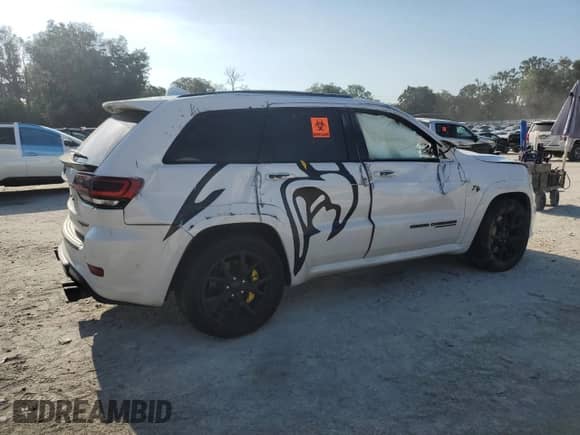 2019 Jeep Grand Cherokee SRT with VIN 1C4RJFDJ8KC636113, listed as a Copart auction lot 66865705 with 63,226 mi miles and Salvage title. Bid and sale history available at DreamBid. Image 3.