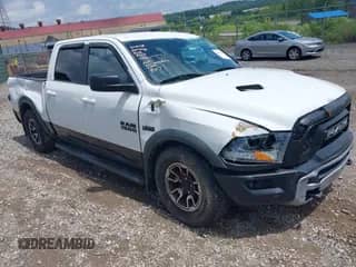 2015 Ram 1500 Rebel with VIN 1C6RR7YT0FS751169, listed as a IAAI auction lot 42689218 with 101,431 mi miles and . Bid and sale history available at DreamBid. Image 1.
