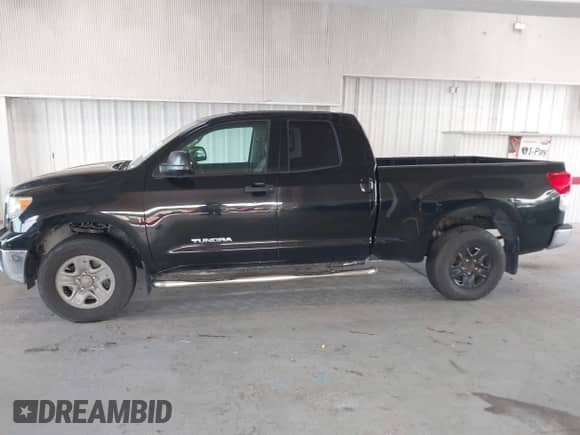 2012 Toyota Tundra с VIN 5TFUM5F15CX028195, выставлен на аукционе IAAI как лот 42607204 с пробегом 202 566 миль миль и . История ставок и продаж доступна на DreamBid. Изображение 14.