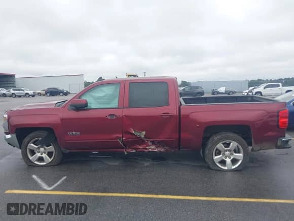 2016 Chevrolet Silverado 1500 LT z VIN 3GCPCRECXGG313494, wystawiony jako IAAI lot #43310056 z przebiegiem 162 696 mil mil oraz . Historia ofert i sprzedaży dostępna na DreamBid. Obrazek 14.