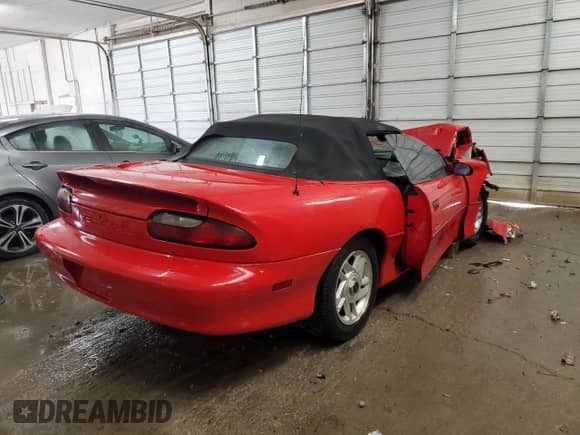1995 Chevrolet Camaro z VIN 2G1FP32S9S2154321, wystawiony jako Copart lot #79828674 z przebiegiem 175 622 mil mil oraz Nie do naprawy • Non repairable. Historia ofert i sprzedaży dostępna na DreamBid. Obrazek 3.