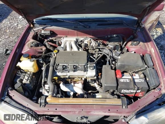 1996 Toyota Camry LE z VIN 4T1BF12K8TU129723, wystawiony jako IAAI lot #41441099 z przebiegiem 245 000 mil mil oraz . Historia ofert i sprzedaży dostępna na DreamBid. Obrazek 10.