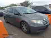 2013 Honda Odyssey EX-L with VIN 5FNRL5H64DB091298, listed as a IAAI auction lot 43589167 with 283,092 mi miles and . Bid and sale history available at DreamBid. Image 1.