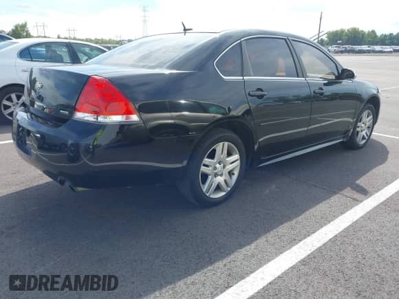 2016 Chevrolet Impala LT with VIN 2G1WB5E35G1104074, listed as a IAAI auction lot 43425341 with 174,409 mi miles and . Bid and sale history available at DreamBid. Image 4.