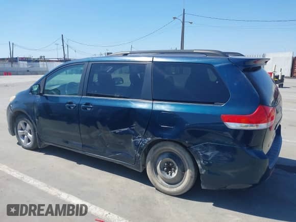 2011 Toyota Sienna LE with VIN 5TDKK3DCXBS117125, listed as a IAAI auction lot 42218382 with 232,320 mi miles and . Bid and sale history available at DreamBid. Image 14.