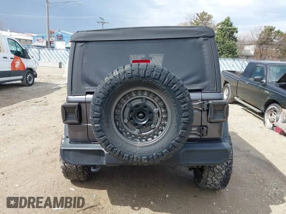 2022 Jeep Wrangler Unlimited Sport S с VIN 1C4HJXDG6NW180234, выставлен на аукционе IAAI как лот 41908743 с пробегом 50 704 миль миль и . История ставок и продаж доступна на DreamBid. Изображение 17.