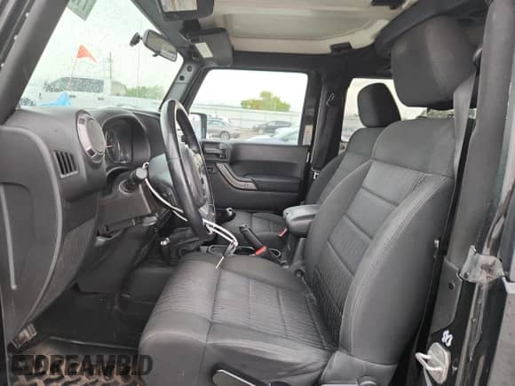 2012 Jeep Wrangler Sport with VIN 1C4AJWAG1CL224526, listed as a Copart auction lot 71076445 with 86,352 mi miles and Salvage title. Bid and sale history available at DreamBid. Image 7.