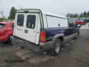 1999 Chevrolet Silverado 2500 LT с VIN 1GCGK29U5XE244556, выставлен на аукционе Copart как лот 82165965 с пробегом Не указан миль и Списание • Salvage title. История ставок и продаж доступна на DreamBid. Изображение 3.