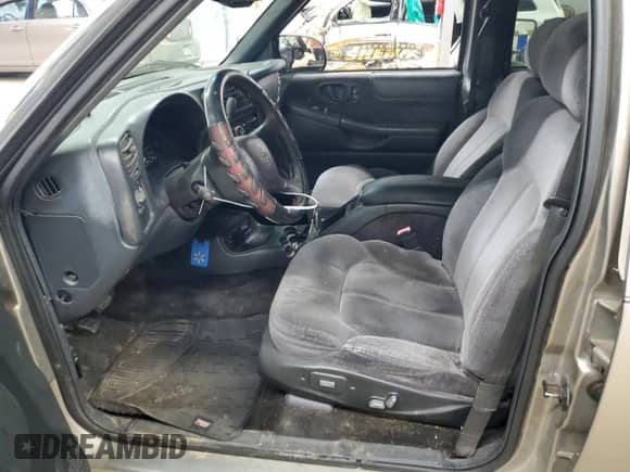 2001 Chevrolet Blazer LT z VIN 1GNDT13W712214351, wystawiony jako Copart lot #70259904 z przebiegiem 191 799 mil mil oraz Szkoda całkowita • Salvage title. Historia ofert i sprzedaży dostępna na DreamBid. Obrazek 7.